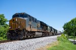 CSX 3407 leads a manifest north at Bugscuffle